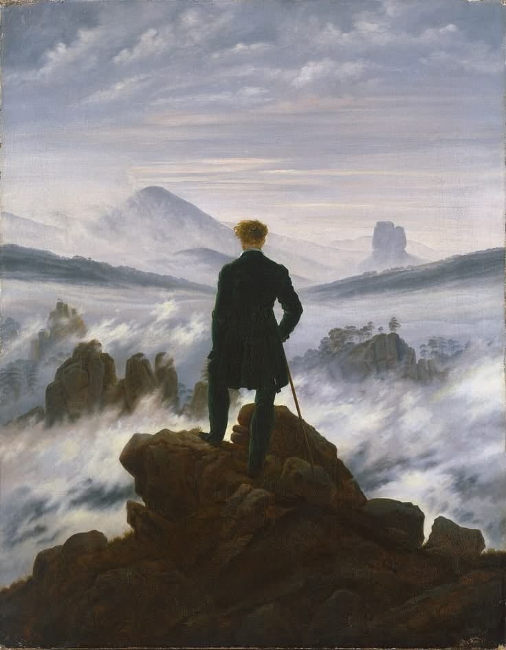 man on mountain summit