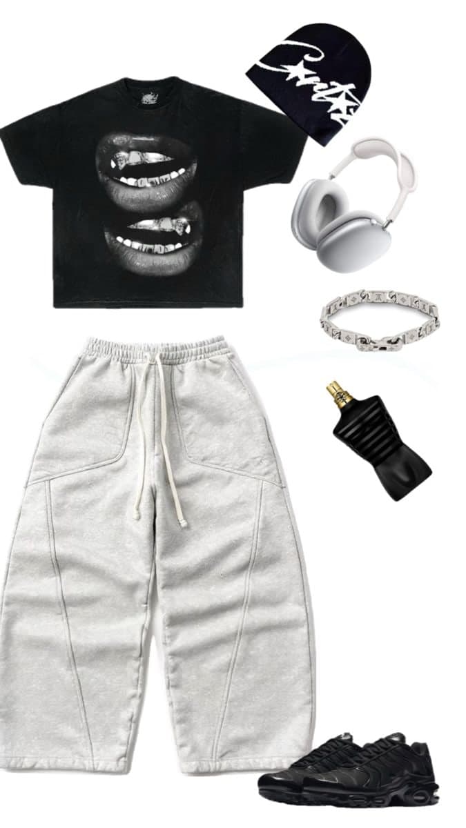 Flatlay of a streetwear outfit with tee, baggy sweats, beanie, headphones, fragr