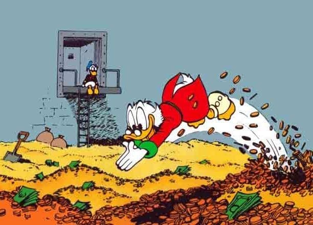 duck on gold pile