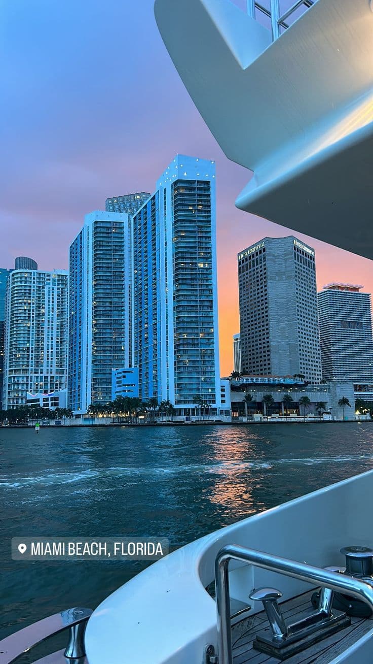 the city skyline as seen from a boat on the water in miami beach, florida