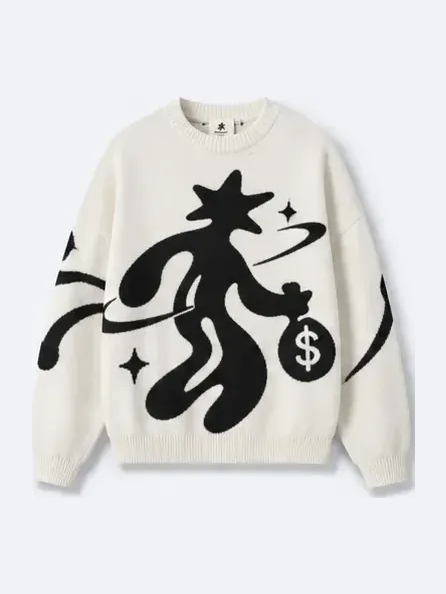 Out of Orbit Knit in cream, the black creature across the front.